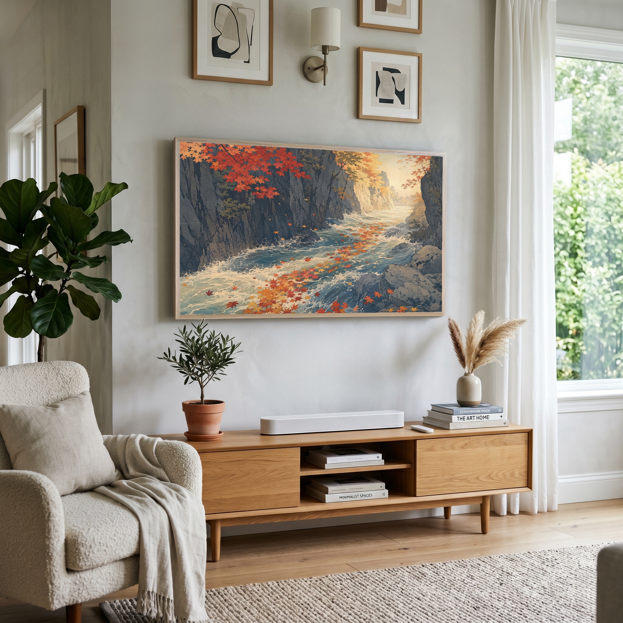 Autumn river artwork displayed in a compact styled room