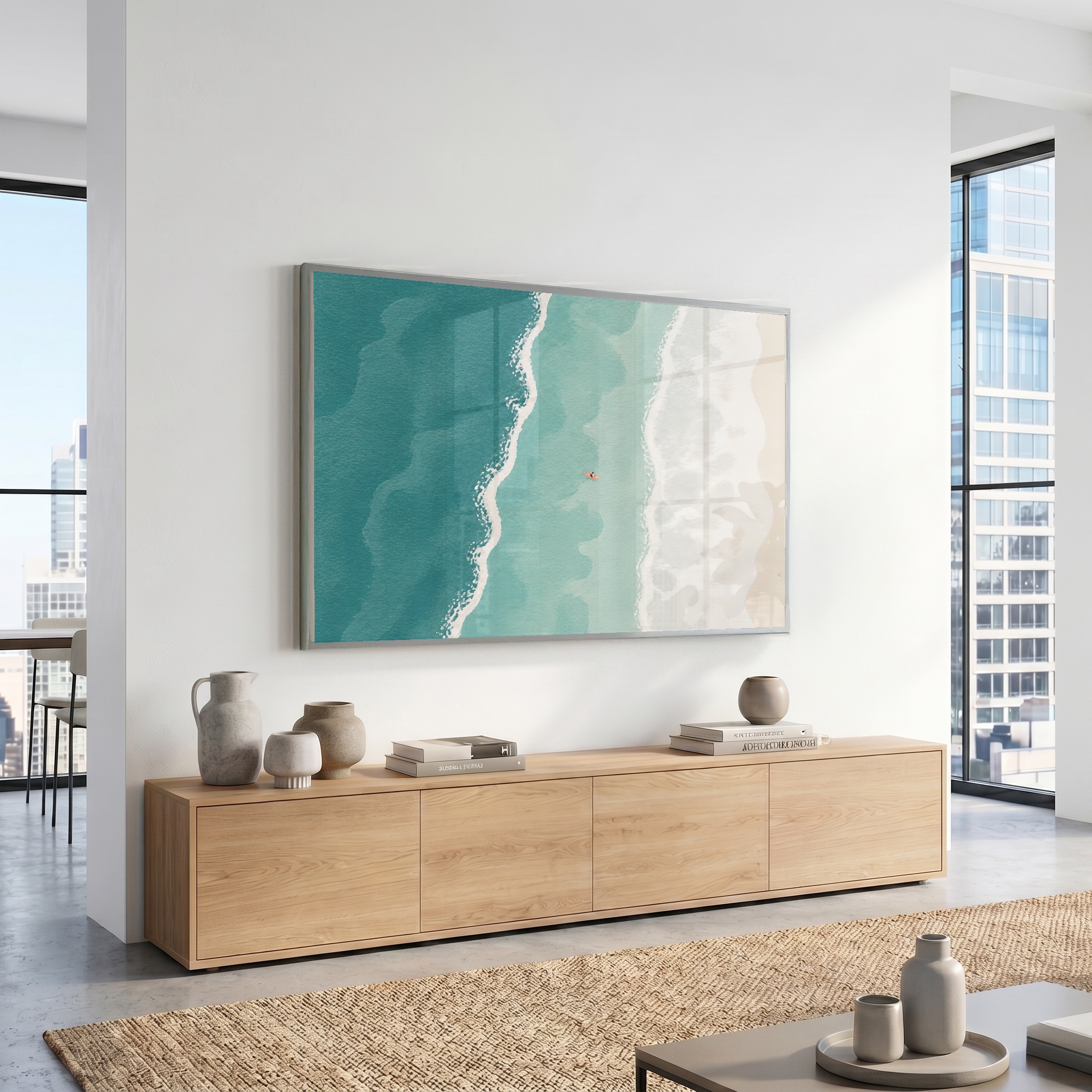 Coastal beach artwork displayed in a bright room